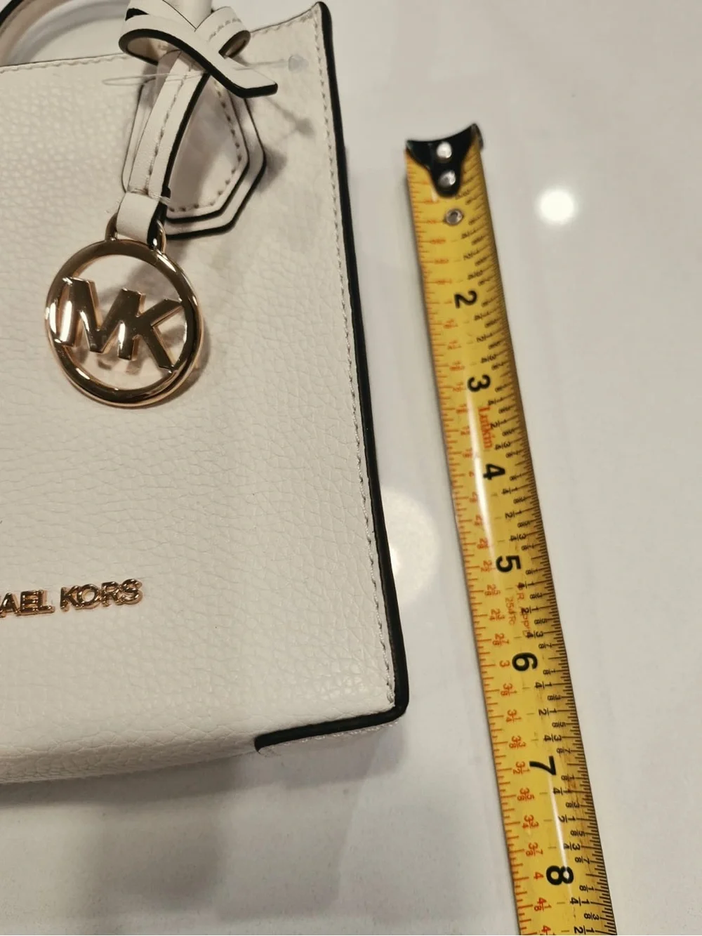 Michael Kors Ivory Mini Crossbody Bag with Gold MK Charm